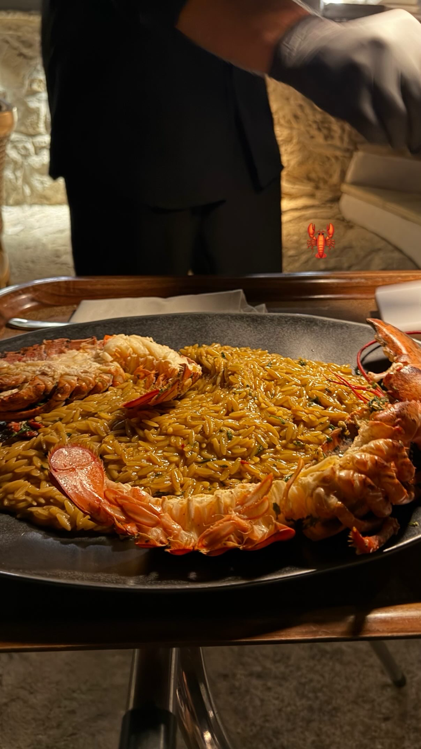 Lobster with orzo being served